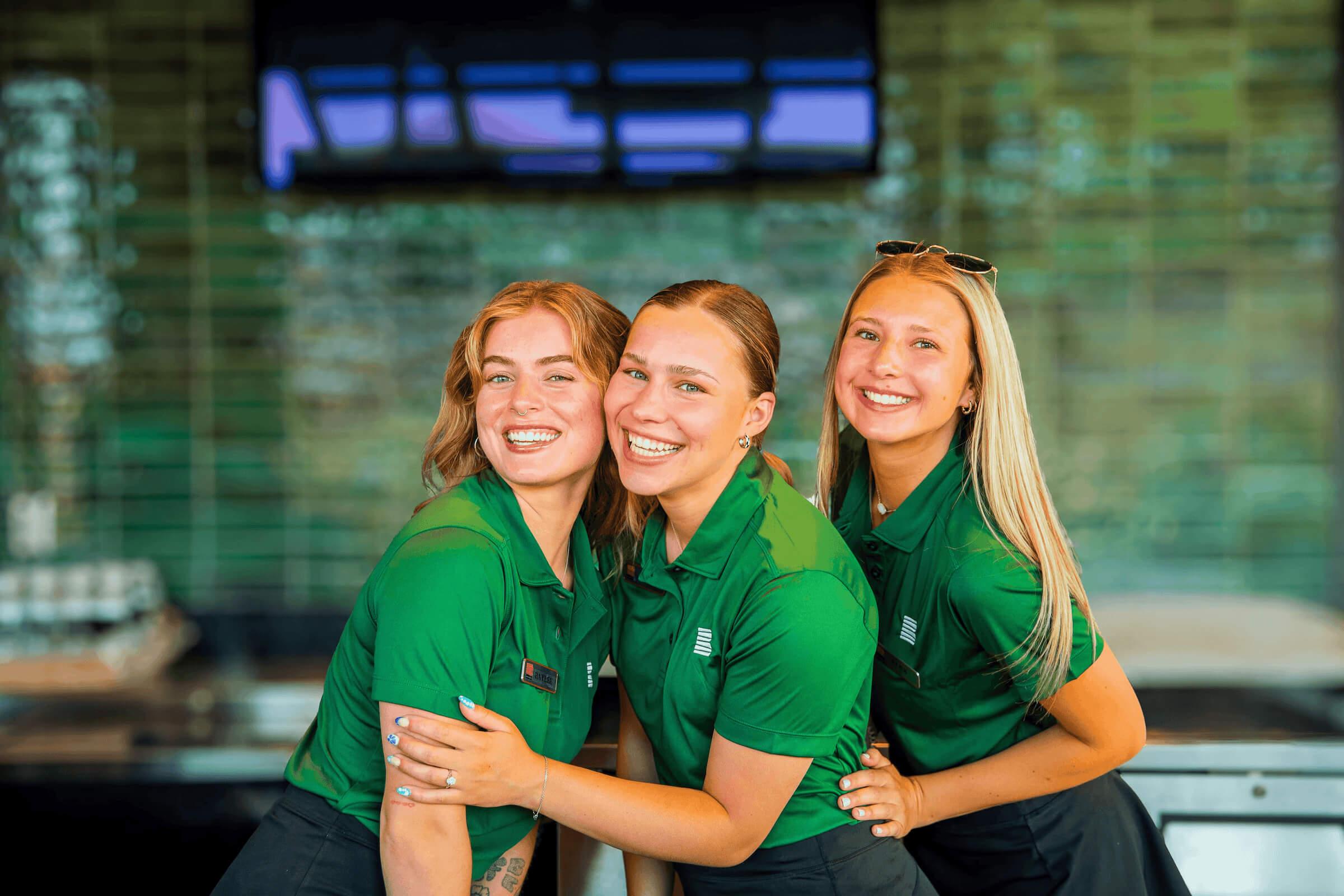 three women smiling