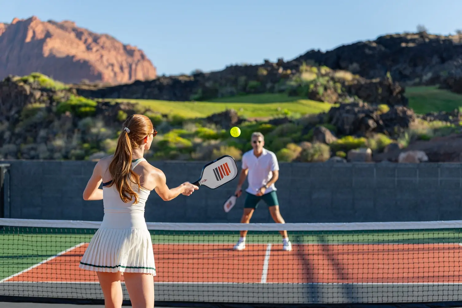 couple playing pickleball at the Black Desert pickleball courts